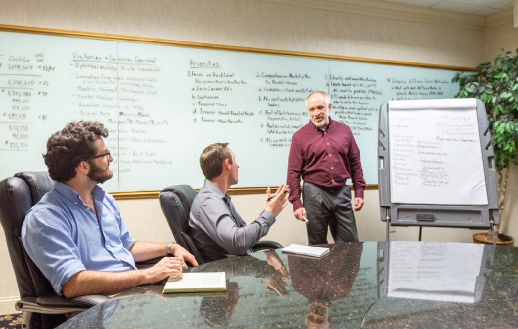 Team Meeting in Conference Room Tablet